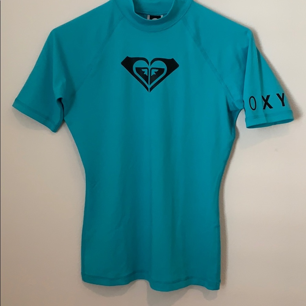 Roxy teal green rash guard tee.